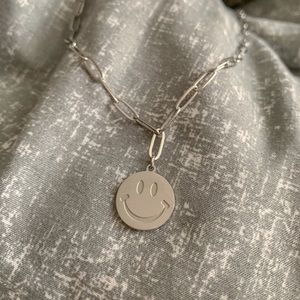 Silver smiley face